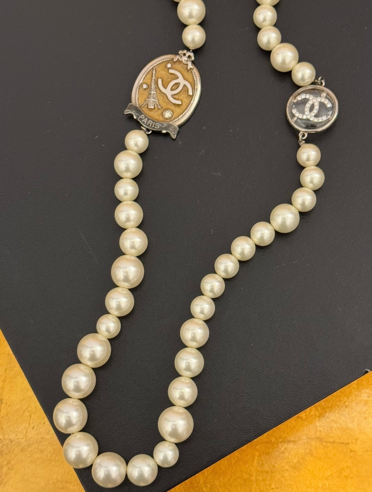 The CHANEL Cruise 2005 Paris Sautoir Necklace Worn by Anne Hathaway in The Devil Wears Prada