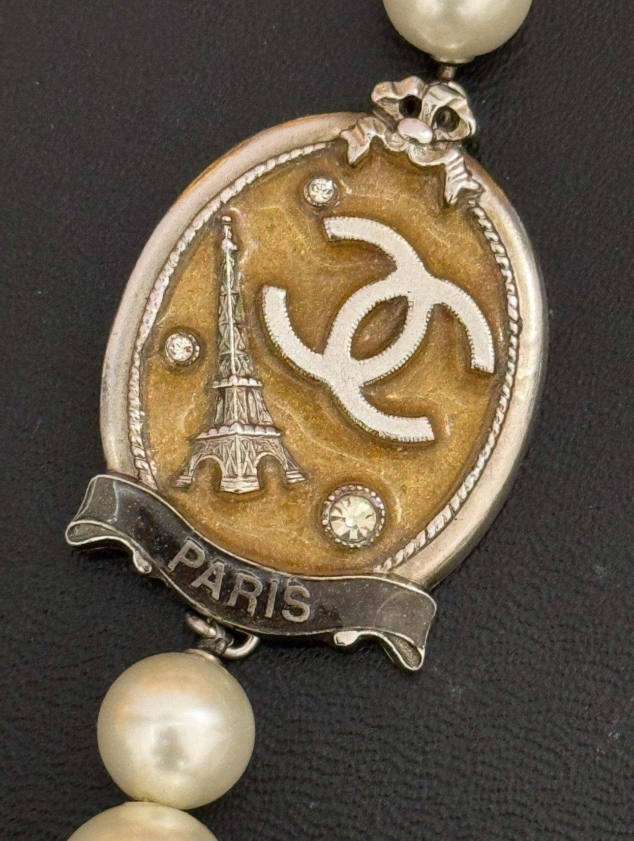 The CHANEL Cruise 2005 Paris Sautoir Necklace Worn by Anne Hathaway in The Devil Wears Prada