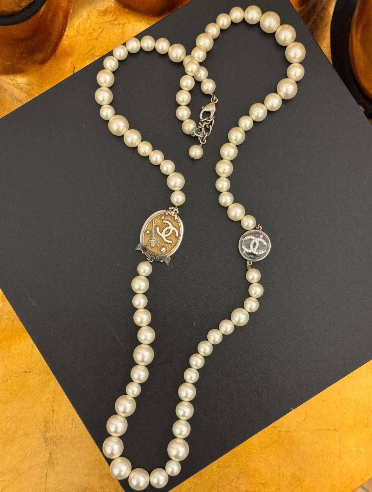 The CHANEL Cruise 2005 Paris Sautoir Necklace Worn by Anne Hathaway in The Devil Wears Prada